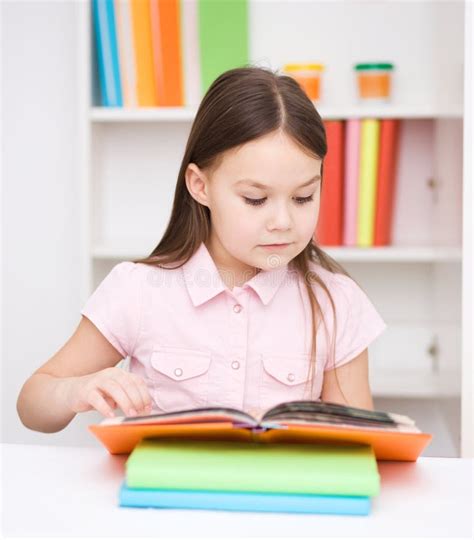 Little Girl Is Reading A Book Stock Photo Image Of Girl Education