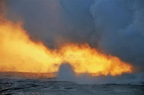 Steam Rising Off Lava Flowing Into Ocean At Sunset Photograph By Sami