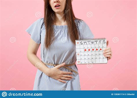 Portrait Sad Sickness Woman In Blue Dress Holding Periods Calendar For