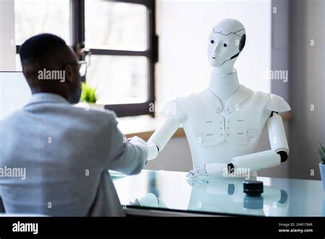 Artificial Intelligence Robot Recruiting African Job Candidate Stock