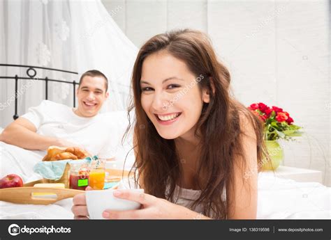 Couple Having Breakfast In Bed Stock Photo By ©nullplus 138319598