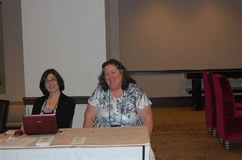 Margery Flax and Ellen Larson relaxing at the MWA table. | Memories