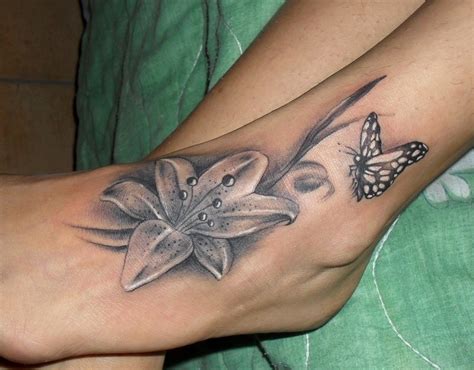 Lily With Butterfly Sexy Foot Tattoo Design Tattooimagesbiz