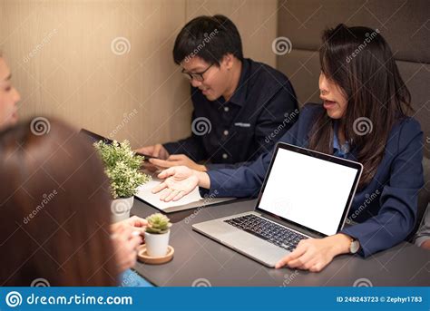 Asian Colleagues Discussing In Office Meeting Room Stock Image Image