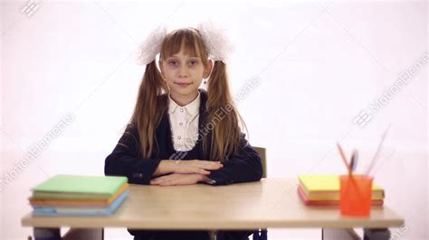 Schoolgirl Sitting At School Desk Stock Video Footage 10198966