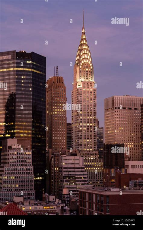 Skyline Of Midtown Manhattan Featuring The Iconic Chrysler Building