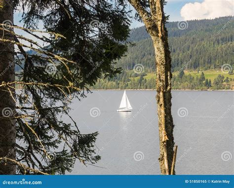 Scenery With A Sailing Ship On A Lake At Black Forest Stock Image