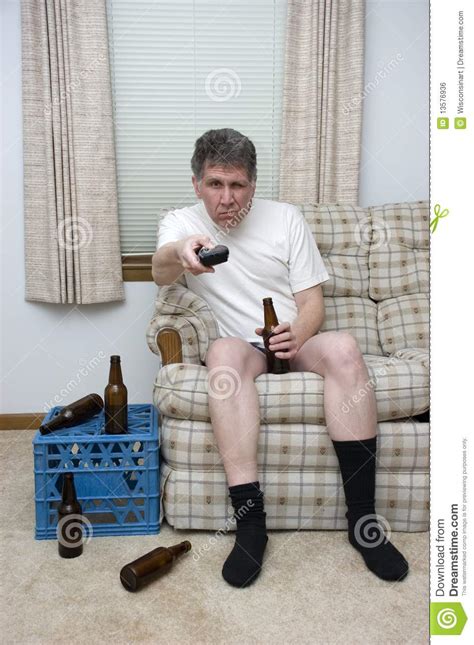 Lazy Man Couch Potato Slob Drunk With Tv Remote Stock