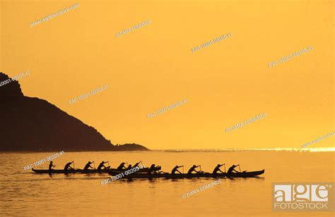 Hawaii Two Outrigger Canoes At Sunset Calm Water Silhouette Stock