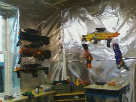 They have a hole that can be used for threading an m4 bolt to secure it to the gun, but probably it won't be necessary. nerf cammando: a nerf gun rack
