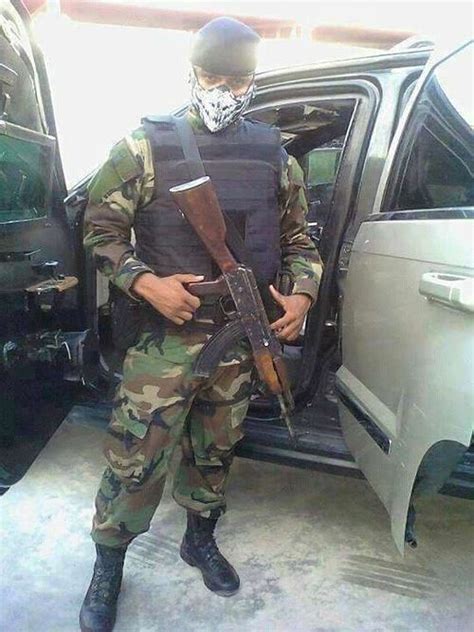 Report Photos Appear To Show Cartel Members Readying For War In Post