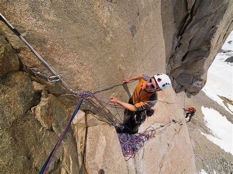 Two Climbers Ascend A Granite Face Photograph By Menno Boermans