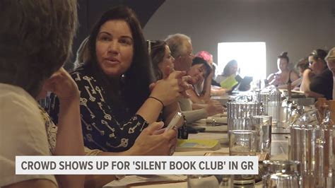 Crowd shows up to silent book club in Grand Rapids | wzzm13.com