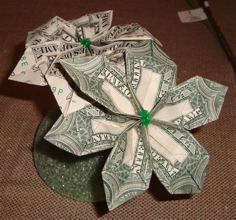 How to make a dollar bill star in origami design by john montroll cómo hacer una estrella con un billete de 1 dólar en origami. How To Make A Money Origami Flower ~ Bliss Tree