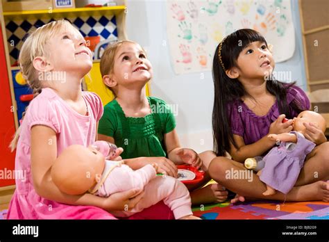 Little Preschool Girls Playing With Dolls Stock Photo Royalty Free