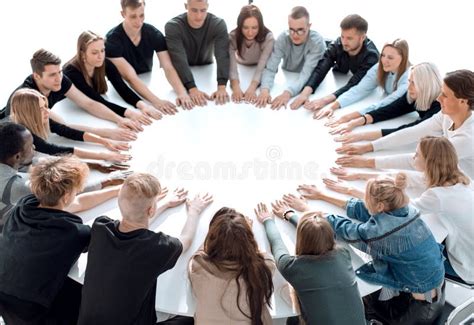 Group Of Diverse Young People Joining Their Palms In A Circle Stock