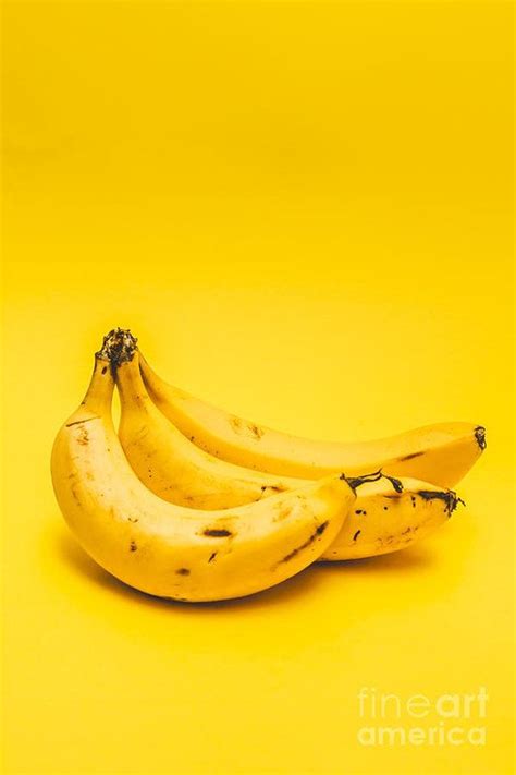 Bananas Art Print Featuring The Photograph Bananas On Yellow Background