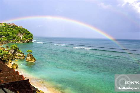 Rainbow Over Oceanbingin Beachbaliindonesia Stock Photo