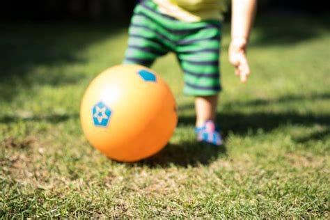 Best Toddler Kicking Ball Stock Photos Pictures And Royalty Free Images