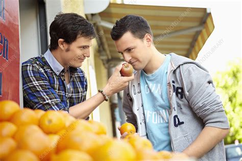 Young people buying fruits and vegetable - Stock Image - F003/5140 ...