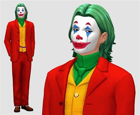 A Man In A Red Suit And Green Hair Is Wearing A Clowns Face