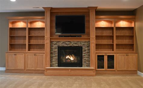 Maybe you would like to learn more about one of these? Fireplace unit surrounded by custom wall built-ins ...