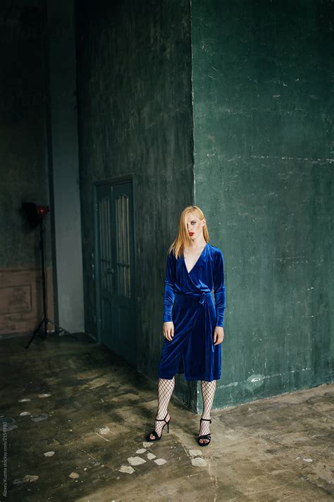 Young Transgender Woman In The Blue Velvet Dress By Stocksy Contributor Alexey Kuzma Stocksy