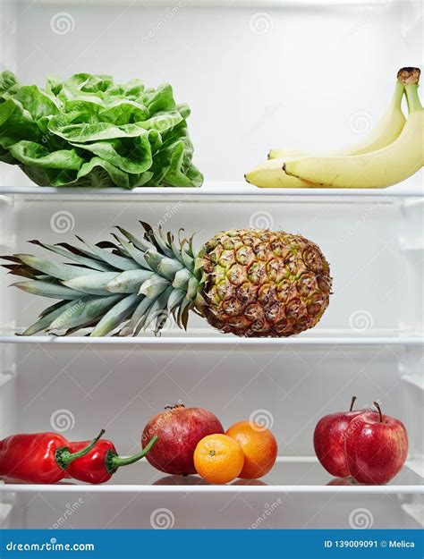 Open Refrigerator Containing Fresh And Healthy Foods Stock Image