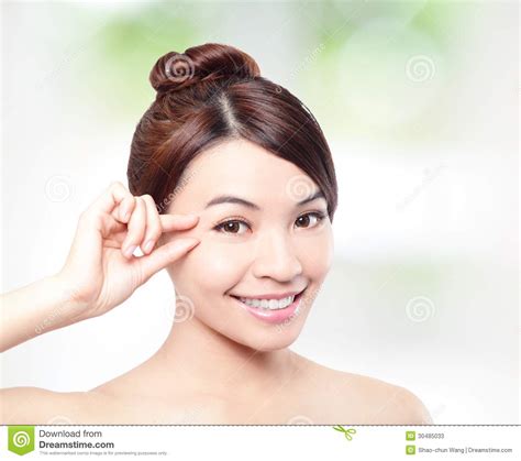 Beautiful Woman Smile Face And Finger Touch Her Eyes Stock
