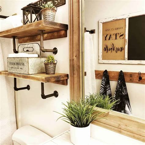 rustic bathroom wall decor with potted plants soul and lane