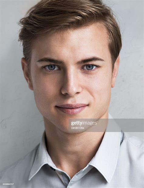 Portrait Of Young Handsome Man Smiling Photo Getty Images