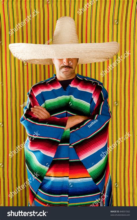 Mexican Typical Poncho Man With Sombrero And Mustache Over Yellow