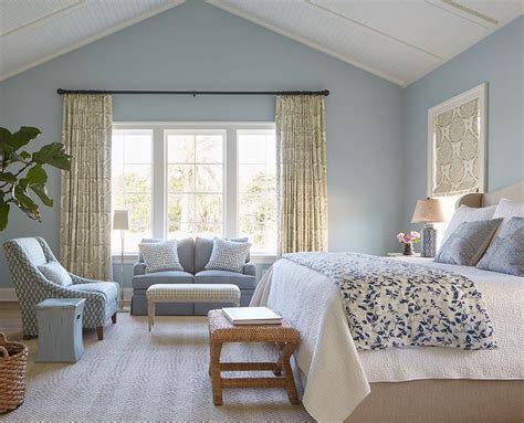 Blue Bedroom With Beige Bed And Mirrored Nightstands Transitional