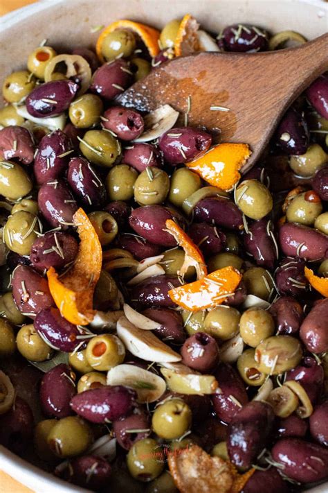 Warm Marinated Olives Appetizer With Rosemary Orange And Garlic