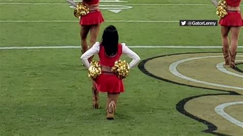 San Francisco 49ers Cheerleader Takes A Knee Before Game Against