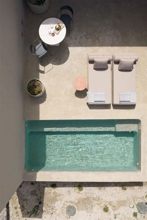 Kapsimalis Architects Designs Monolithic Holiday Home In Santorini