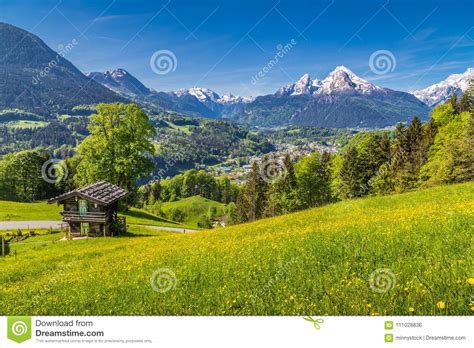Alpine Scenery With Traditional Mountain Chalet In Summer Stock Photo