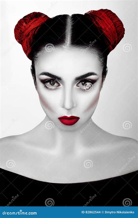 Portrait Of A Girl In A High Fashion Beauty Style With White Skin Red