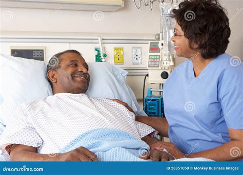 Nurse Talking To Senior Male Patient On Ward Stock Photo Image 28851050