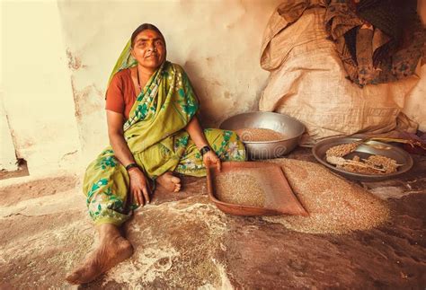 Woman Sifting Grain At Her Rural House In Indian Village Editorial Image Image Of Enjoyment