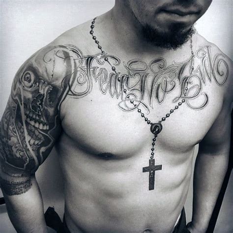 People looking to get a religious tattoo often go with this cross design. 100 Rosary Tattoos For Men - Sacred Prayer Ink Designs