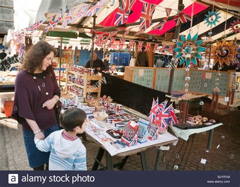 A Mother And Child Buying British The Market Market Square Cambridge