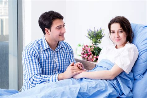 The Caring Loving Husband Visiting Pregnant Wife In Hospital Stock Image Image Of Hands