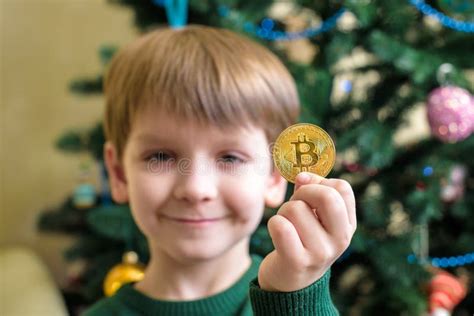 One Bitcoin In The Hand Of Young Boy Concept Stock Image Image Of