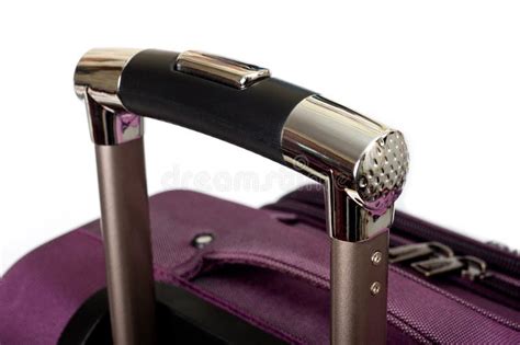 Purple Travel Suitcase With Metal Folding Handle And On Wheels Stock