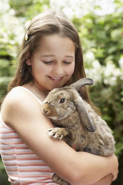 Cute Little Girl With Her Pet Rabbit Stock Photo Image Of Female A24
