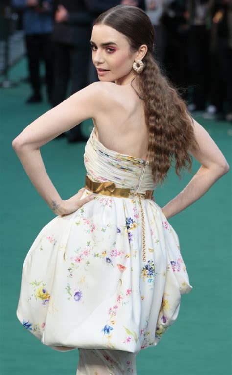 Lily Collins Blooms In Floral Strapless Gown At Tolkien Premiere In London
