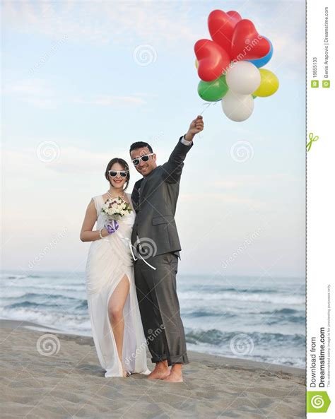 Romantic Beach Wedding At Sunset Stock Image - Image of adult, female: 19855133
