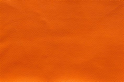 Premium Photo Orange Background Of Orange Leather Sheet Texture