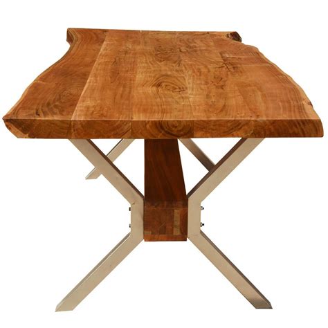 Simple, modern design meets rustic, natural style in this large rectangular live edge wood bench table handcrafted in india, the live edge wood table top is secured to wide, flat, black iron legs positioned in a stylish geometric pattern. Hankin Rustic Solid Wood & Iron Live Edge Dining Table